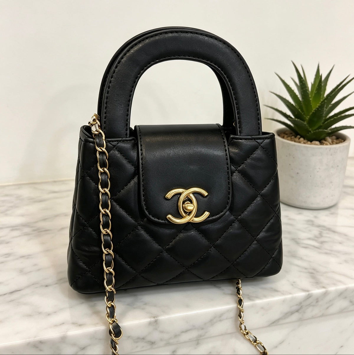 Mini Quilted Top-Handle Channel Bag