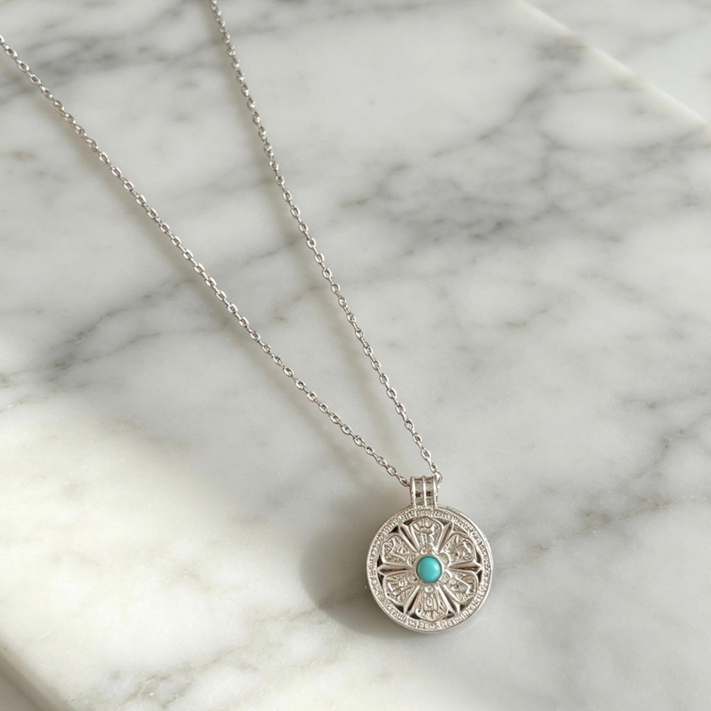 Silver Spinning Pendant Necklace with Turquoise Centre Stone