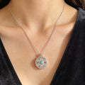 Silver Spinning Pendant Necklace with Turquoise Centre Stone