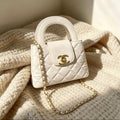 Mini Quilted Top-Handle Channel Bag